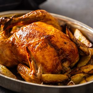 Whole,Baked,Golden,Crispy,Chicken,In,A,Pan,Cooked,With